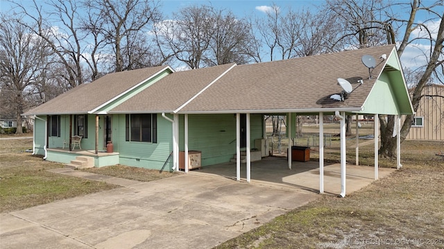 view of front of house with a carport