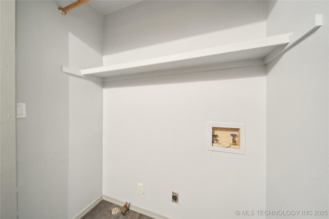 laundry room featuring hardwood / wood-style floors, hookup for a washing machine, and electric dryer hookup