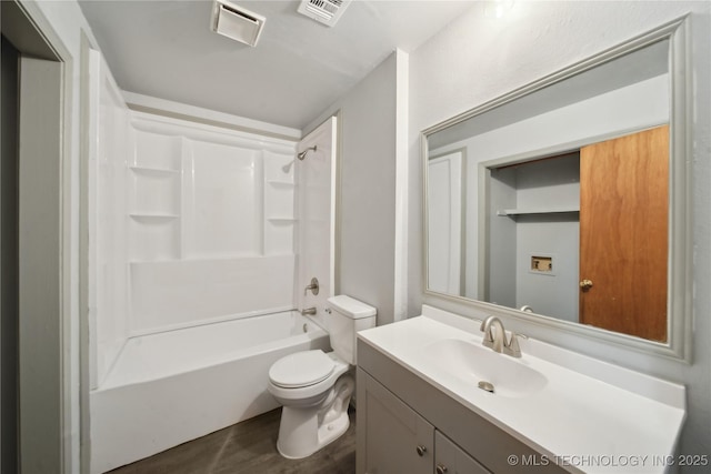 full bathroom with shower / tub combination, vanity, and toilet