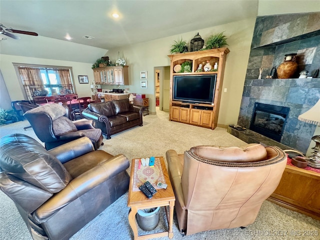 3 Huntly, Burneyville, OK 73430 - living area with vaulted ceiling, light carpet, a fireplace, a ceiling fan, and visible vents