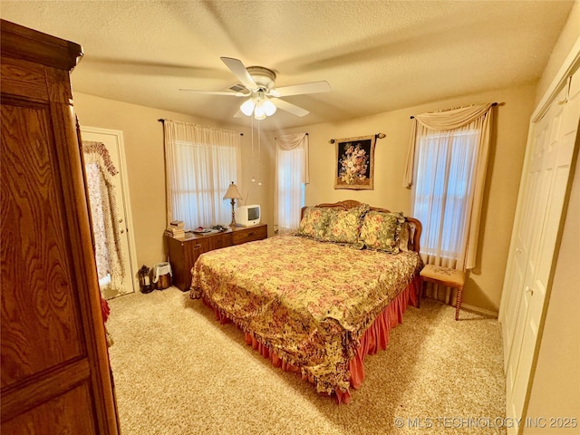 3 Huntly, Burneyville, OK 73430 - bedroom with ceiling fan, light colored carpet, and a textured ceiling