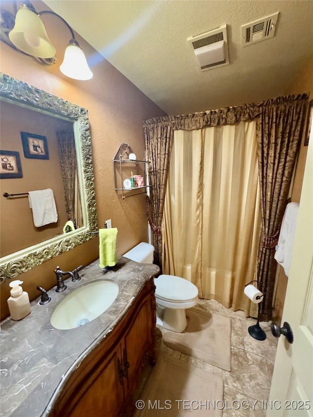 3 Huntly, Burneyville, OK 73430 - bathroom with toilet, vanity, and visible vents