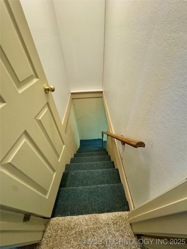 3 Huntly, Burneyville, OK 73430 - stairs featuring a textured wall and carpet