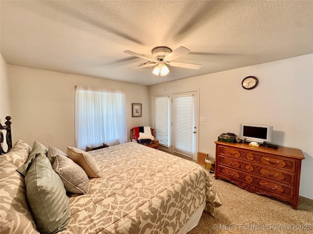 3 Huntly, Burneyville, OK 73430 - bedroom with a textured ceiling, a ceiling fan, and carpet