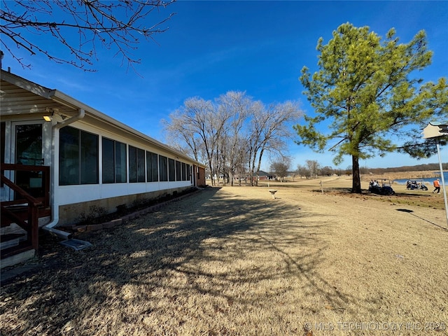 3 Huntly, Burneyville, OK 73430 - view of yard featuring a sunroom