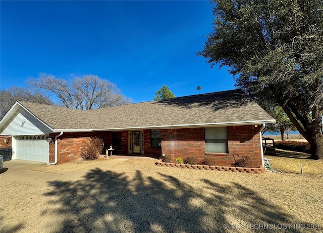 3 Huntly, Burneyville, OK 73430 - ranch-style home featuring an attached garage, a shingled roof, driveway, and brick siding
