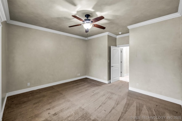 empty room with ornamental molding, carpet floors, and ceiling fan