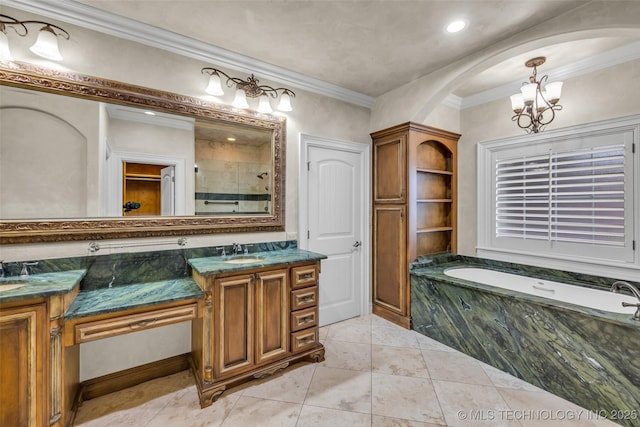 bathroom with tile patterned flooring, an inviting chandelier, vanity, ornamental molding, and separate shower and tub