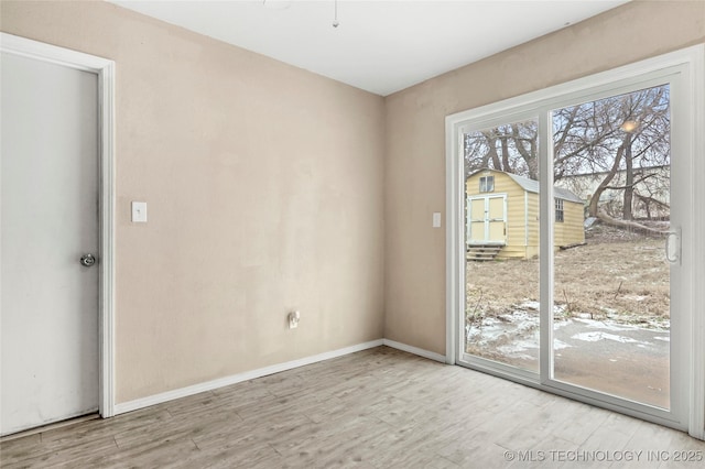 doorway featuring light hardwood / wood-style floors