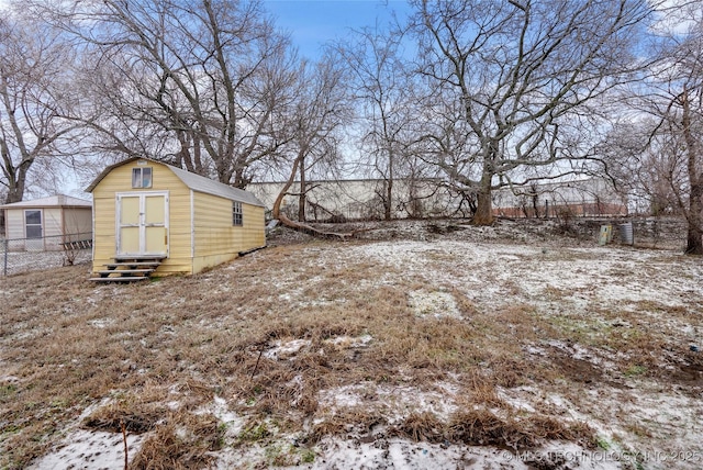 view of yard layered in snow