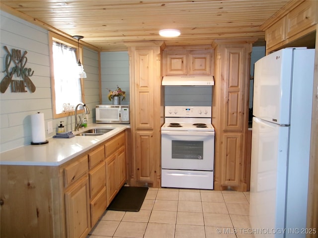 kitchen with pendant lighting, sink, white appliances, and wooden ceiling