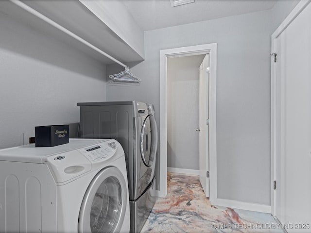 laundry area with separate washer and dryer