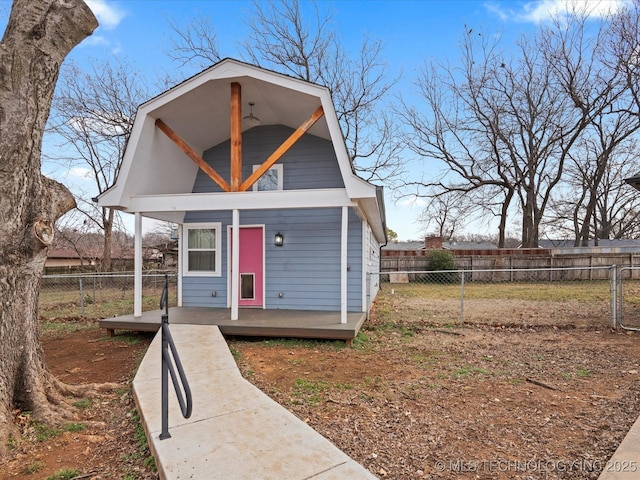 view of front of home featuring an outbuilding