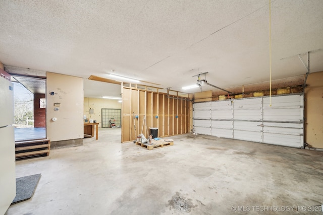 garage featuring white refrigerator