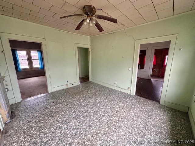 spare room featuring ceiling fan