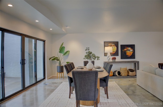 2411 E 72nd Pl Unit 2-A-3, Tulsa, OK 74136 - dining room with finished concrete floors and recessed lighting