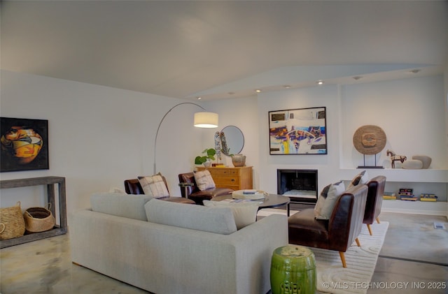2411 E 72nd Pl Unit 2-A-3, Tulsa, OK 74136 - living area with finished concrete floors, a fireplace, recessed lighting, and vaulted ceiling