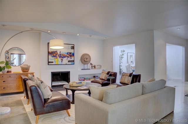 2411 E 72nd Pl Unit 2-A-3, Tulsa, OK 74136 - living area with a fireplace, vaulted ceiling, and recessed lighting