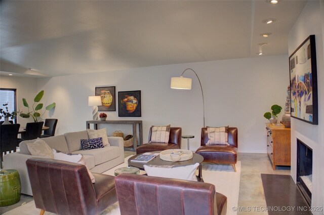 2411 E 72nd Pl Unit 2-A-3, Tulsa, OK 74136 - living room featuring recessed lighting