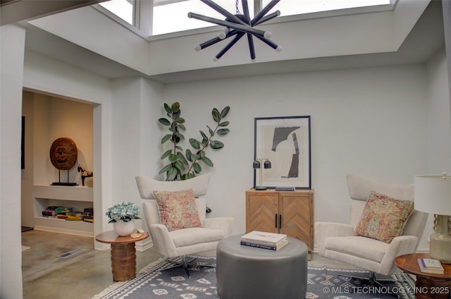 2411 E 72nd Pl Unit 2-A-3, Tulsa, OK 74136 - sitting room featuring a skylight and finished concrete flooring