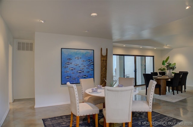 2411 E 72nd Pl Unit 2-A-3, Tulsa, OK 74136 - dining area featuring finished concrete floors and recessed lighting