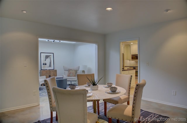 2411 E 72nd Pl Unit 2-A-3, Tulsa, OK 74136 - dining area featuring baseboards and recessed lighting