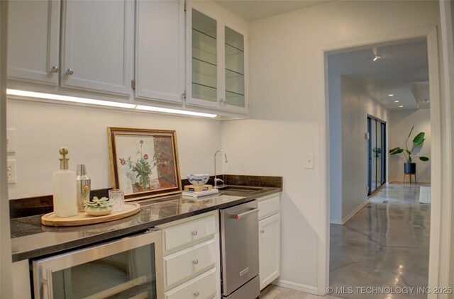 2411 E 72nd Pl Unit 2-A-3, Tulsa, OK 74136 - bar with beverage cooler and stainless steel dishwasher
