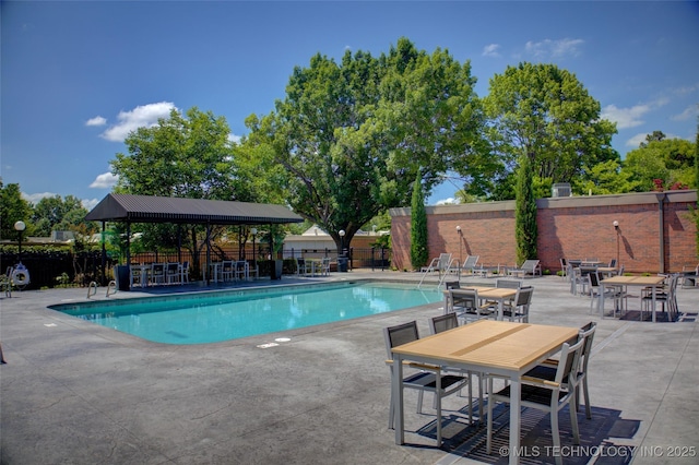 2411 E 72nd Pl Unit 2-A-3, Tulsa, OK 74136 - community pool featuring a patio and a gazebo