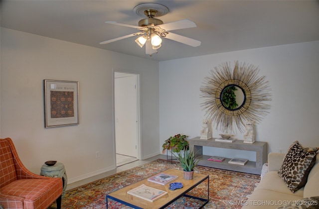 2411 E 72nd Pl Unit 2-A-3, Tulsa, OK 74136 - living room with baseboards and ceiling fan
