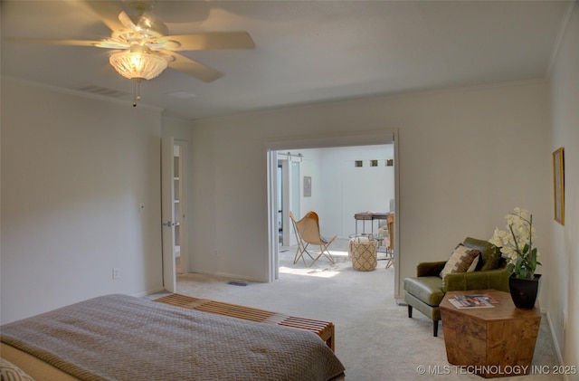 2411 E 72nd Pl Unit 2-A-3, Tulsa, OK 74136 - bedroom with light carpet, ornamental molding, and a ceiling fan