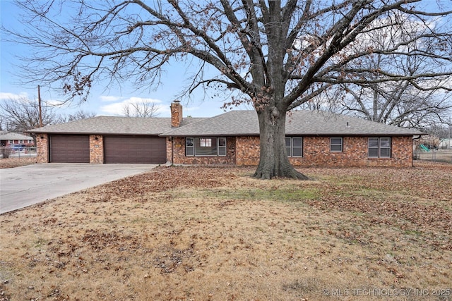 single story home with a garage