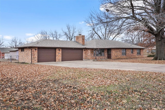 single story home with a garage