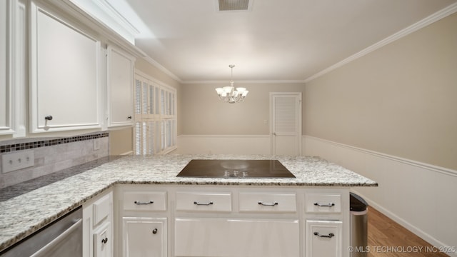 kitchen featuring stainless steel dishwasher, black electric stovetop, kitchen peninsula, and white cabinets