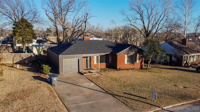 ranch-style home with a garage and a front lawn