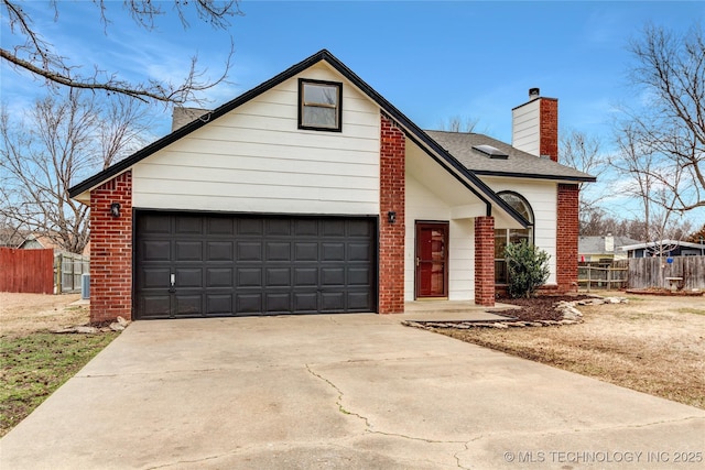 view of front of property featuring a garage