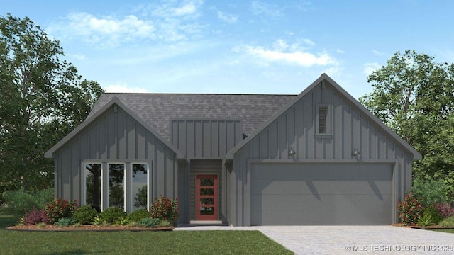 modern farmhouse style home with a garage and a front yard