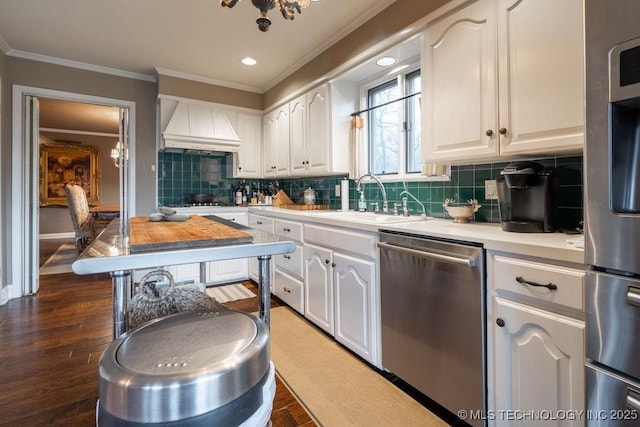 kitchen featuring crown molding, stainless steel dishwasher, white cabinets, custom exhaust hood, and light countertops