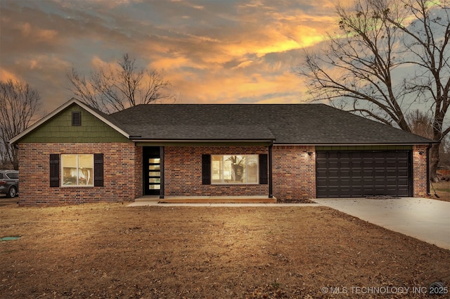 view of front of home with a garage