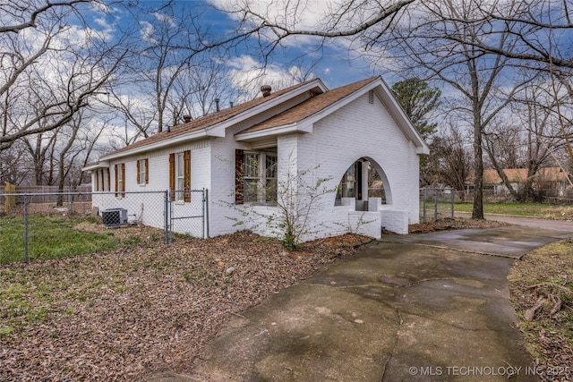 view of home's exterior with central AC unit