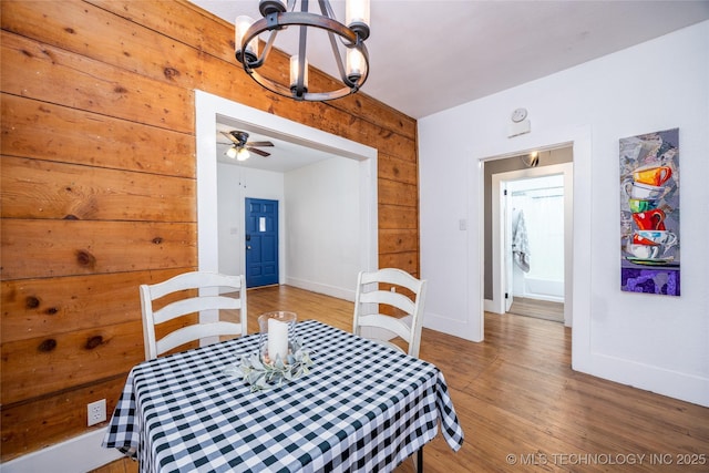 dining room with hardwood / wood-style flooring