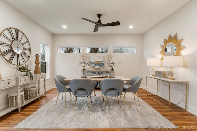dining room featuring baseboards, recessed lighting, wood finished floors, and a ceiling fan
