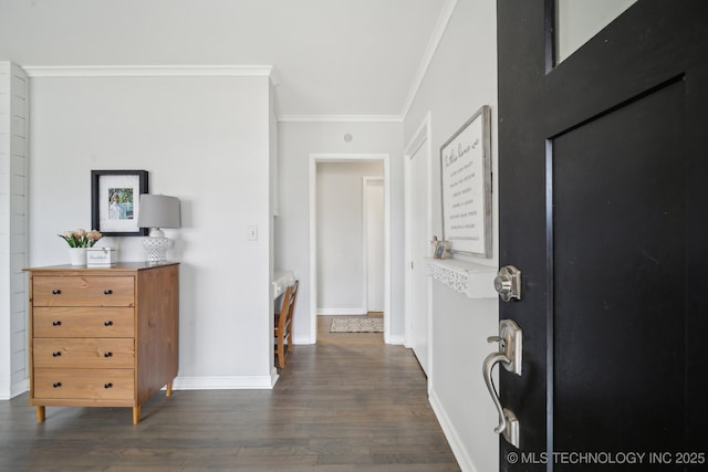 hall with ornamental molding and dark hardwood / wood-style floors