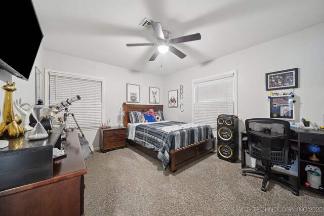 carpeted bedroom featuring ceiling fan