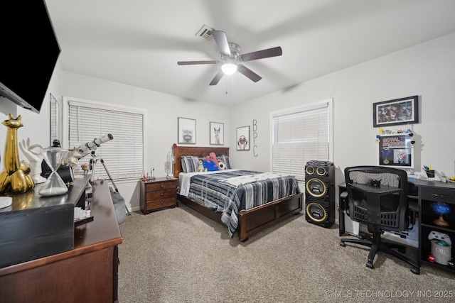 carpeted bedroom with ceiling fan