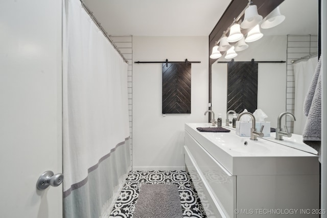 bathroom featuring vanity and tile patterned flooring