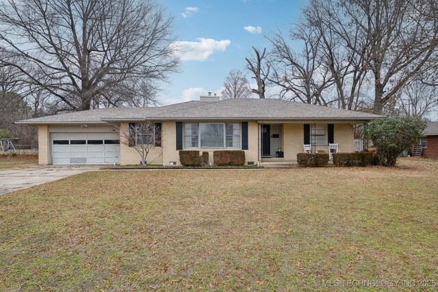 single story home featuring a garage, a porch, and a front yard