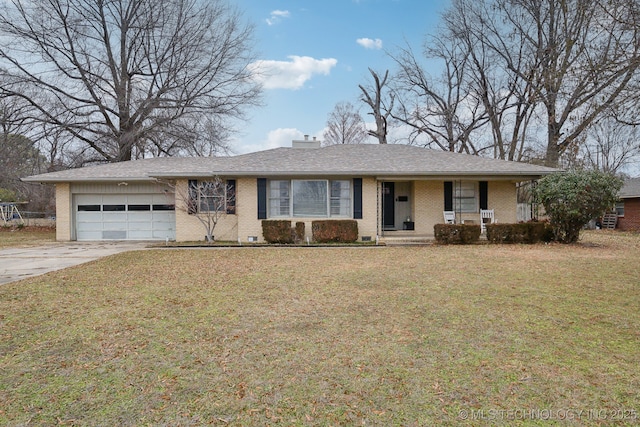 single story home featuring a garage, a front yard, and covered porch