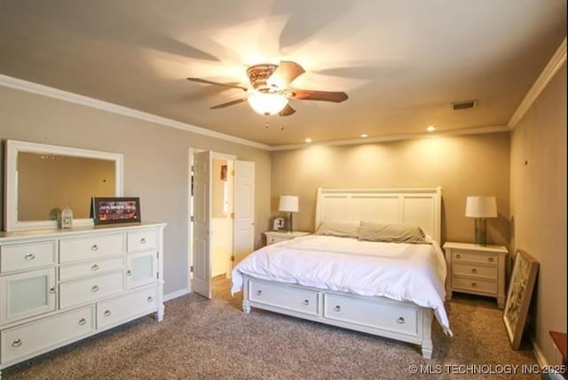 bedroom with carpet floors, ornamental molding, and ceiling fan