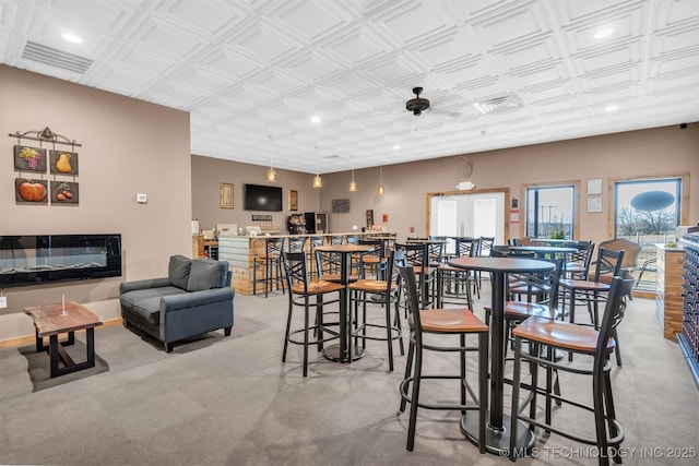 488 Rock House Rd, Bennington, OK 74723 - dining room with visible vents, indoor wet bar, and recessed lighting