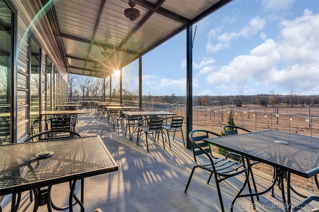 view of patio / terrace with a rural view